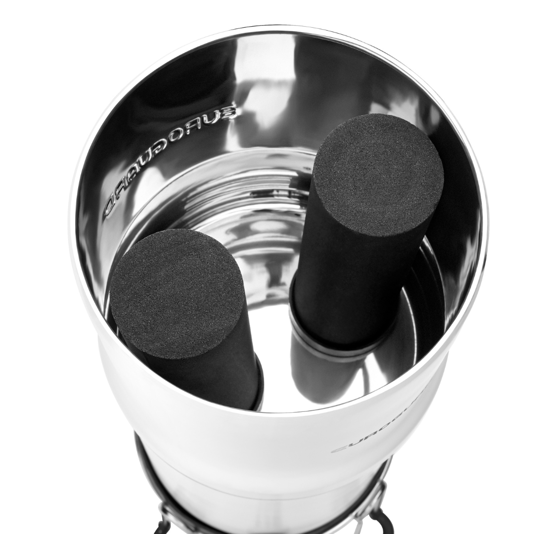 Metallic drink shaker with black rubber ends on a white background